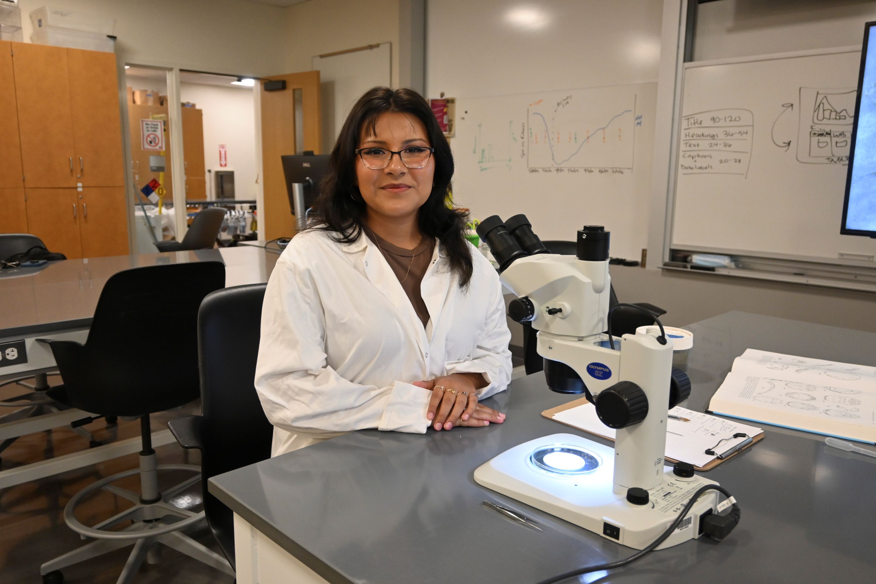 Woman at microscope