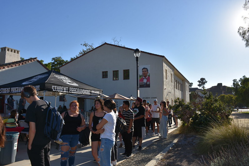 Picture of Student Union Building, people standing in line for event